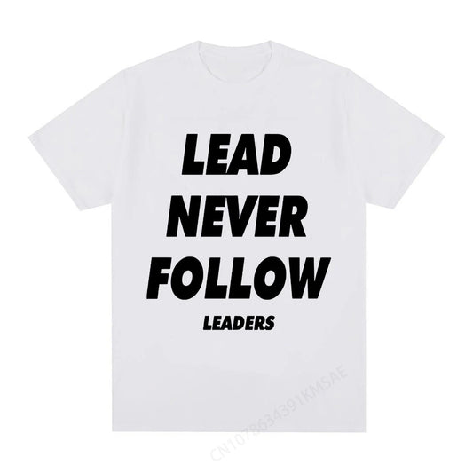 White t-shirt with 'LEAD NEVER FOLLOW LEADERS' text on a white background